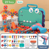 A green dinosaur-themed drill and screw building toy set with an electric drill and various components.