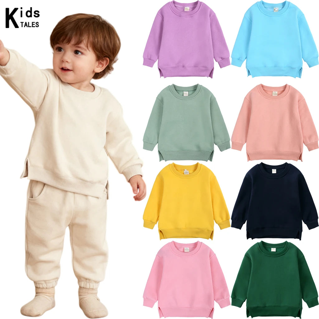 A collection of pastel colored pullover hoodies for boys and girls, including lavender, light blue, mint green, pink, yellow,