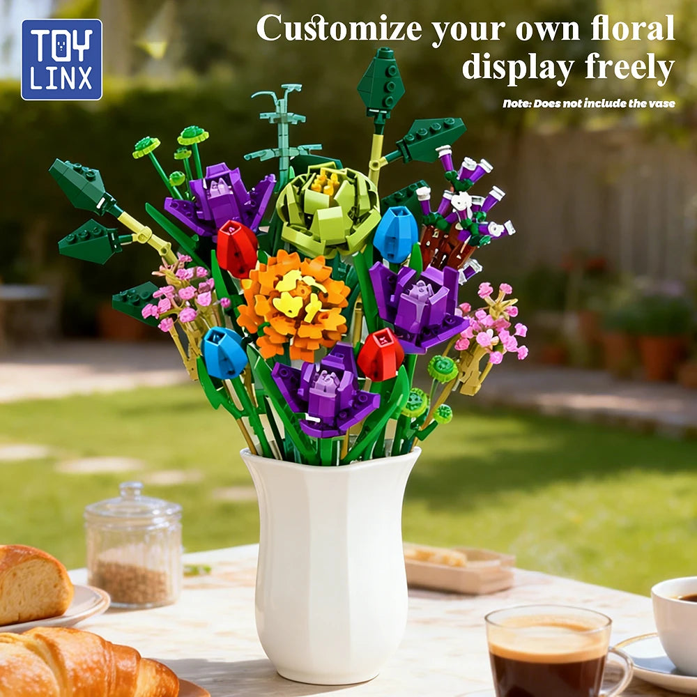 A colorful floral display made from building blocks arranged in a white vase outdoors.