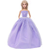 A blonde doll wearing a purple strapless evening gown with a tulle skirt and a pearl belt.