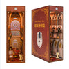 A wooden book nook kit featuring an arched gothic window design with internal lighting and a dust cover.