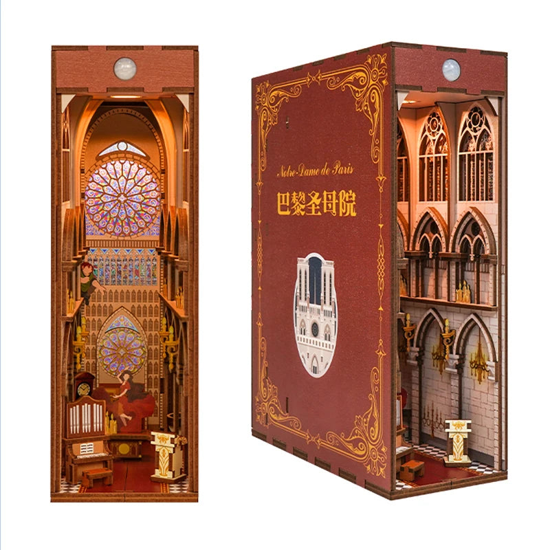 A wooden book nook kit featuring an arched gothic window design with internal lighting and a dust cover.