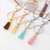 Four gold and silver chain necklaces with mixed color velvet tassels for DIY jewelry