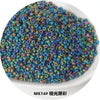 A pile of small, iridescent metallic glass beads in various shades of blue and green.