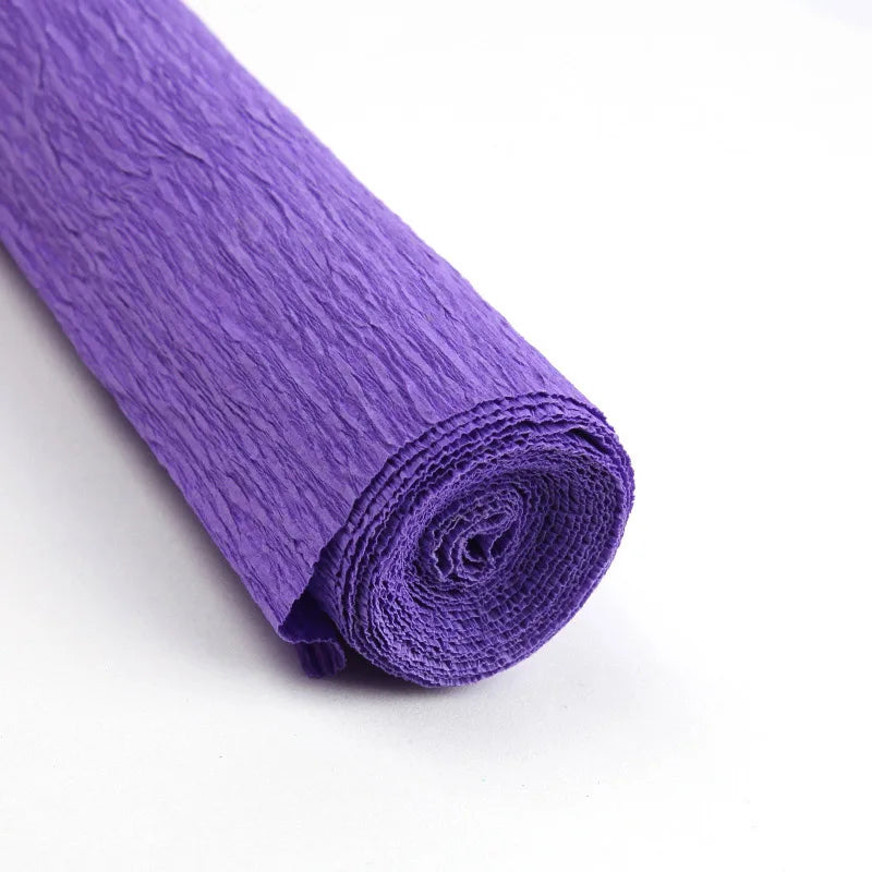 A roll of purple crepe paper for DIY crafts and gift wrapping.