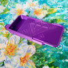 A purple diamond painting organizer tray with storage compartments is shown on a colorful background.