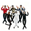 A collection of five stylized plush dolls resembling Michael Jackson with movable joints.