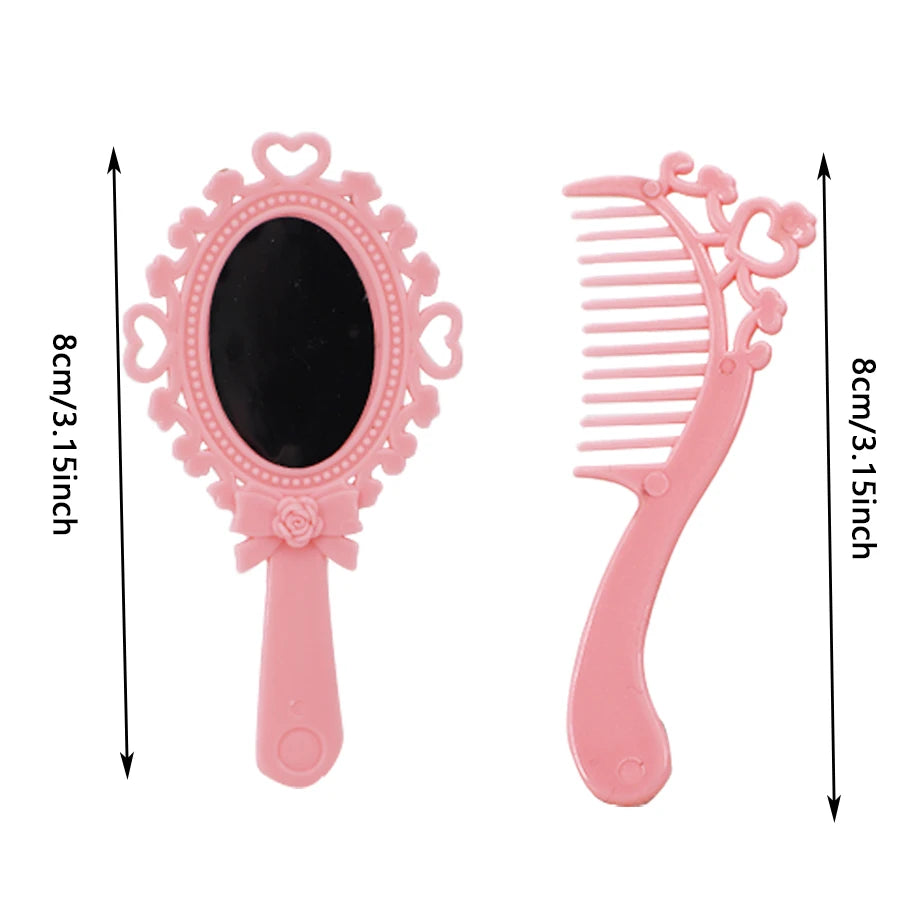 Pink doll feeding and care accessory set featuring a mirror and a comb.