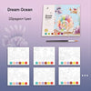 A watercolor painting book titled Dream Ocean featuring illustrations of sea creatures and a large seashell.