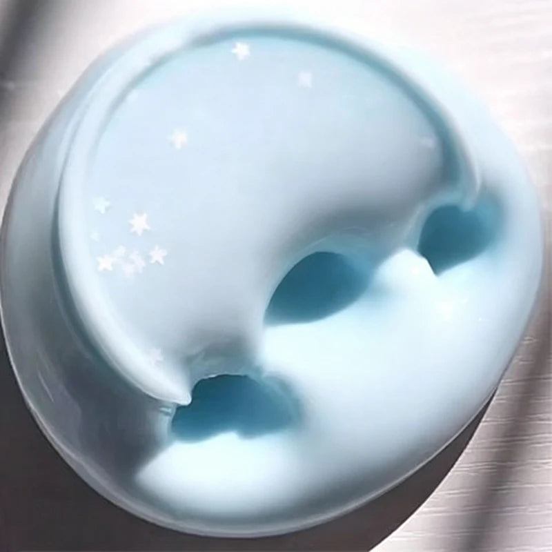 A round, translucent blue slime product is shown in a light, smooth texture.