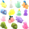 A collection of colorful squishy dinosaur fidget toys in various shades including yellow, green, purple, and pink.