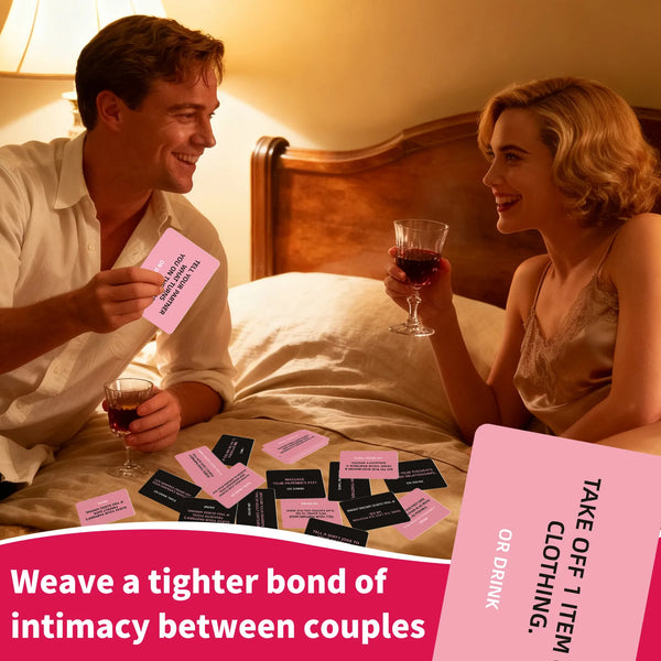 A couple smiling while playing a card game together in a warm, intimate setting.