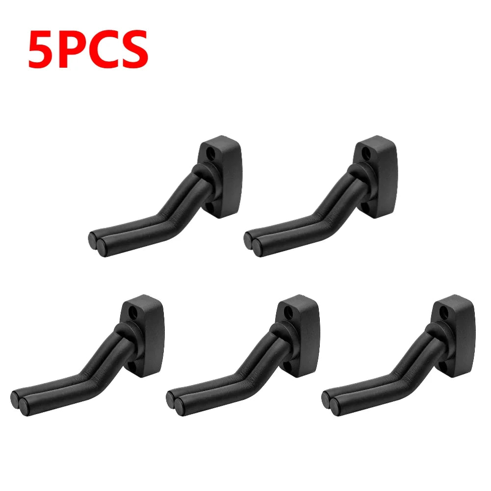 Five black wall mount guitar hangers with non-slip holders.