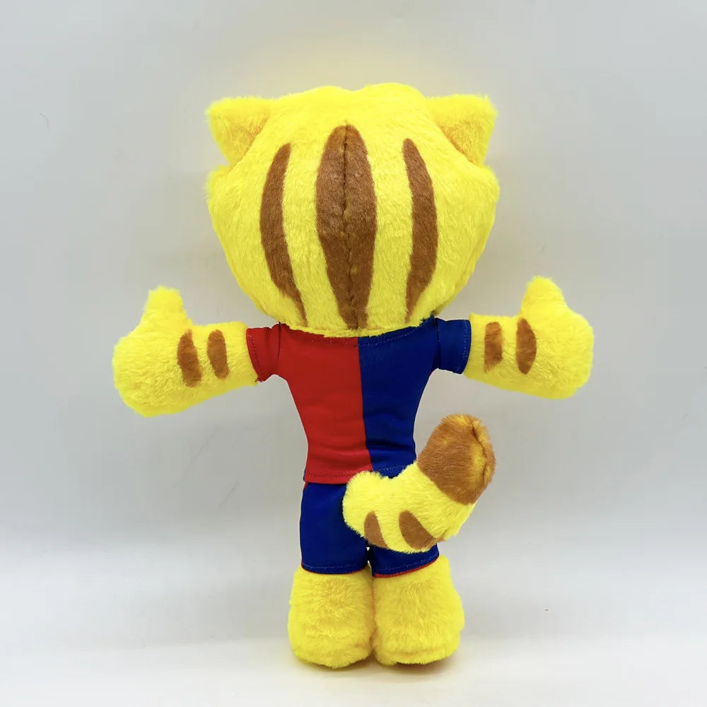 A yellow and brown striped cat football mascot plush toy with a red and blue body.