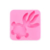 A pink silicone mold shaped like a hand is shown for a Magic Water Elf DIY craft kit.