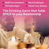 A close-up photo of two people laughing and toasting during a fun date night with drinks.