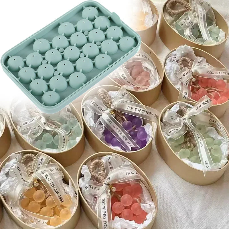 Various silicone grape cluster molds for soap and candle making displayed in various colors and packaging.
