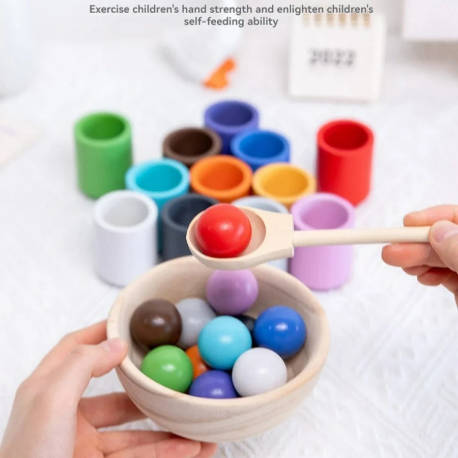 Hands holding a wooden bowl filled with colorful balls for a Montessori sorting game