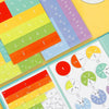 A collection of colorful magnetic fraction tiles arranged in rows and columns for math learning.