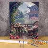 A paint by numbers kit featuring a flower field and wooden house landscape painting on canvas.