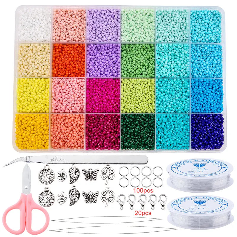 A variety of colored glass seed beads in 24 shades are displayed in compartments and packaged with tools for jewelry making.