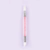 A dual-ended silicone head nail art dotting pen with a crystal handle.