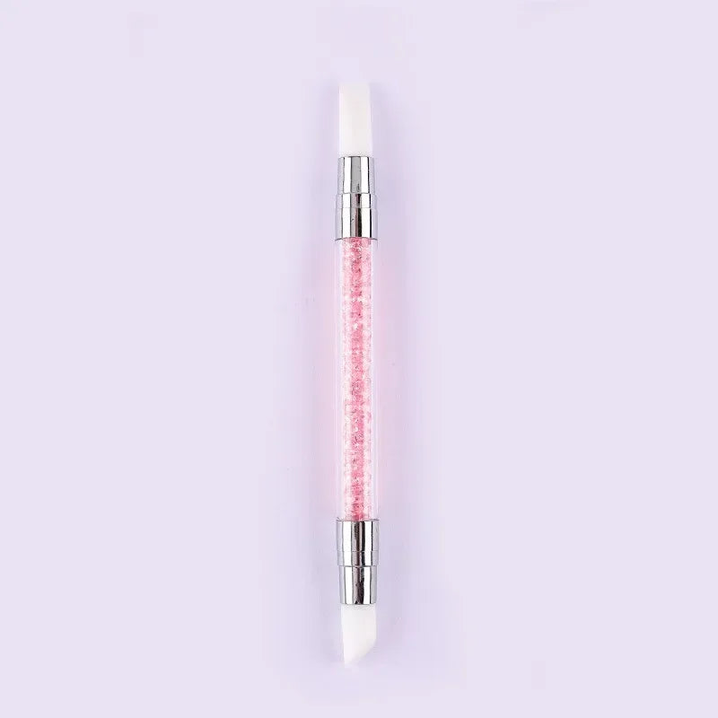 A dual-ended silicone head nail art dotting pen with a crystal handle.