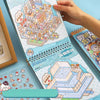 A close-up of a simulated construction game book featuring detailed miniature scenes and building blocks for crafting.