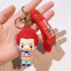 A red and white resin keychain featuring an Hunter x Hunter anime character figurine attached to a leather tag.