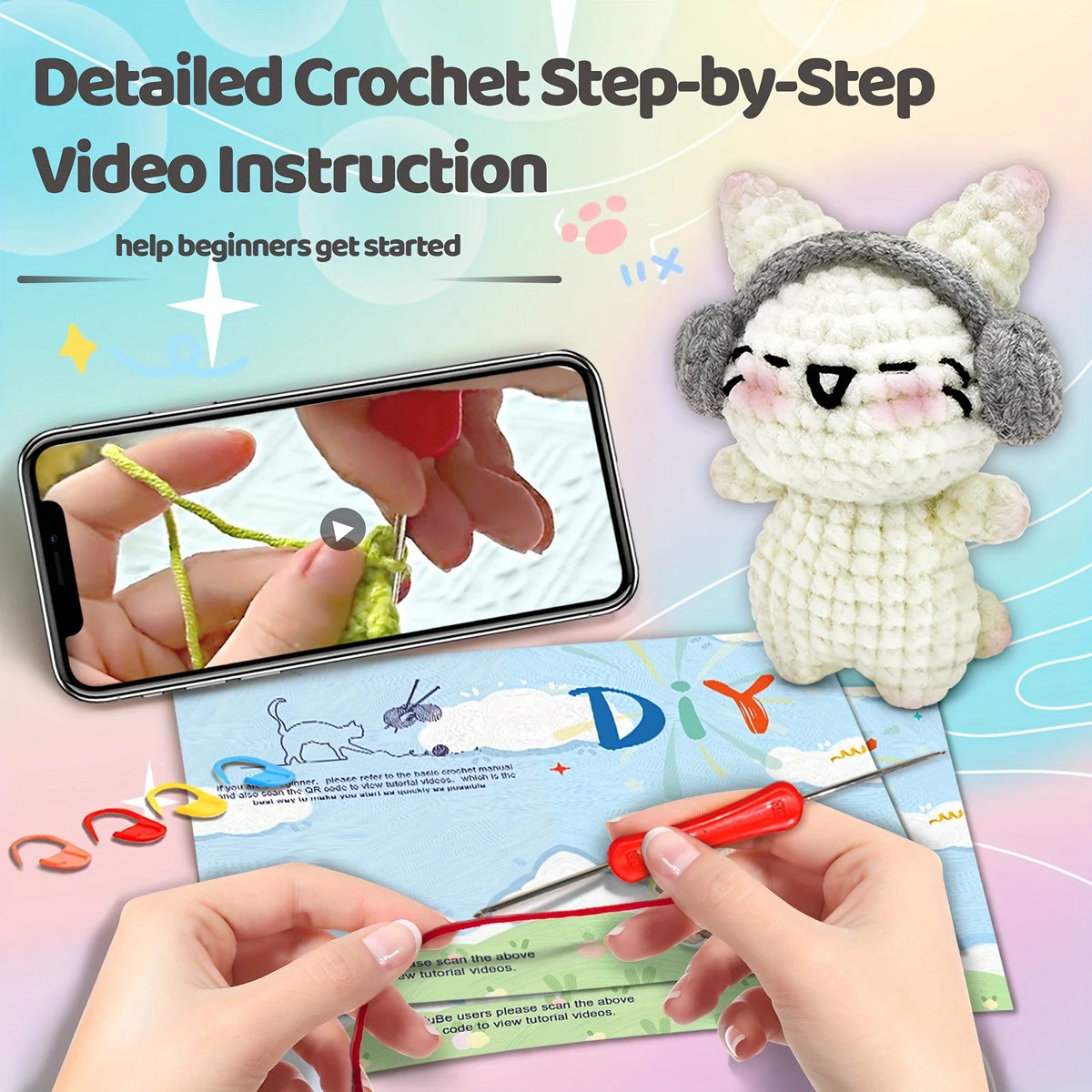 A detailed crochet kit showing a finished white kitten toy and instructional materials for beginners.