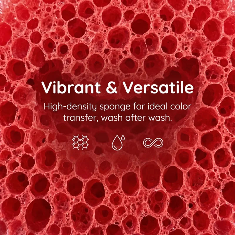 Close-up view of a vibrant red, high-density sponge with an open cellular structure.