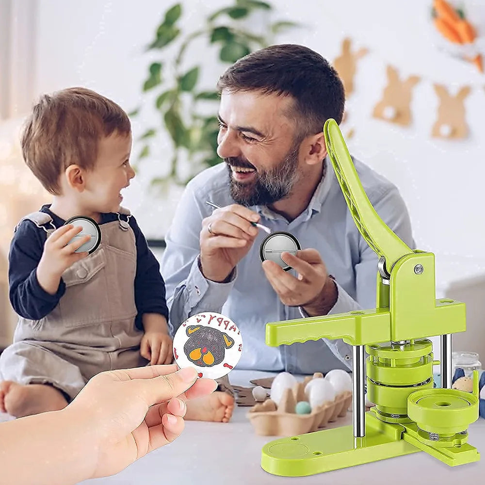 A man and a child are using a DIY badge maker kit to create badges.