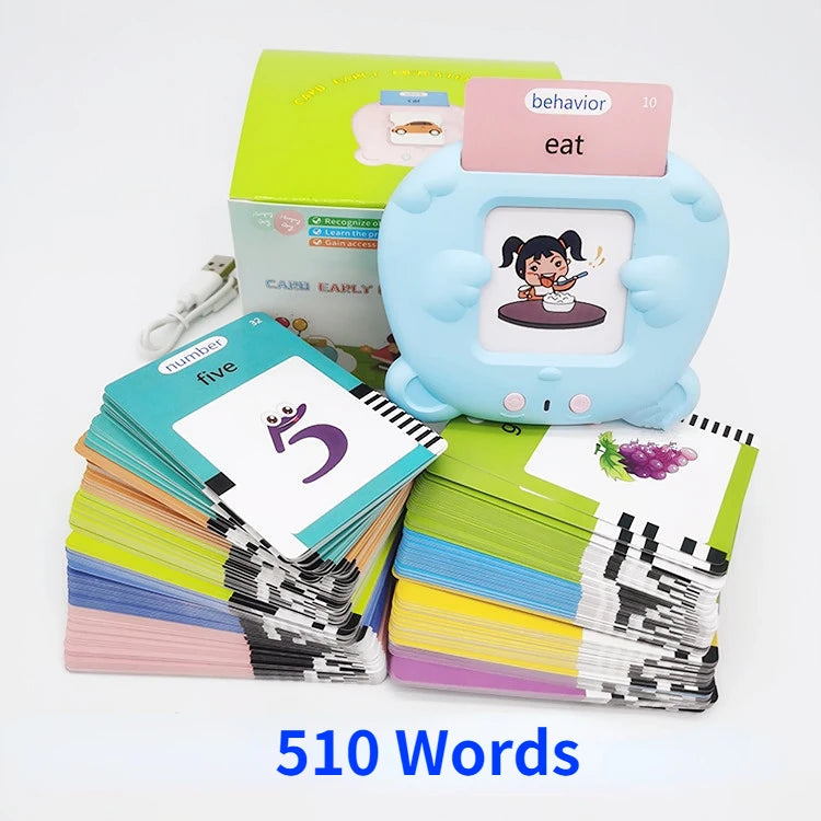 A stack of colorful flash cards and a blue talking toy with an eat card is shown.