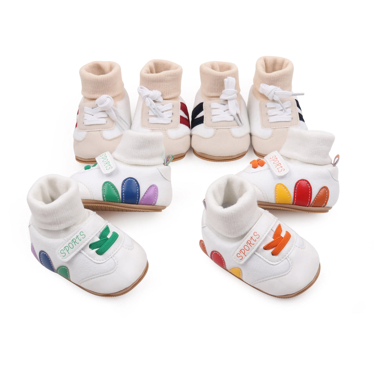 A set of five beige and white ankle-hugging baby booties with laces and anti-slip soles.