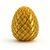 A golden, textured dragon egg fidget spinner with a faceted surface.