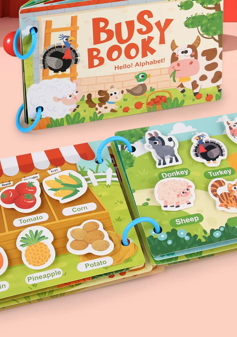 A colorful Montessori quiet book featuring illustrations of farm animals and fruits, designed for toddlers.
