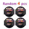 Random set of 4 Halloween mystery squishy fidget toys including glitter pumpkin, eyeball, and skull stress relief balls