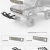 A clear plastic 1:24 scale Chevrolet K5 Blazer RC crawler with various aftermarket accessories like front faces, a bumper, ro