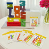 A set of wooden number building blocks spelling out 123456 and accompanying double-sided cards for early math learning