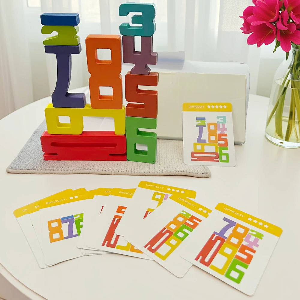 A set of wooden number building blocks spelling out 123456 and accompanying double-sided cards for early math learning