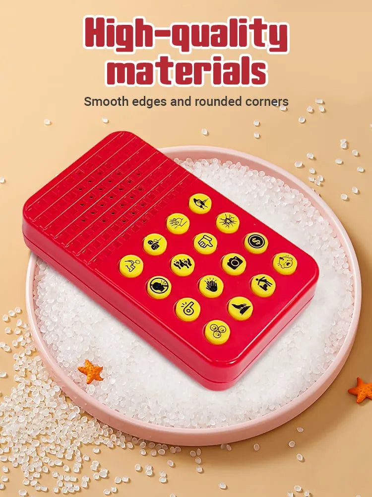 A red button with yellow sound effect buttons is placed on a pink plate surrounded by white salt crystals.