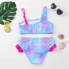 A purple and blue two-piece swimsuit set for girls with scale patterns, displayed on a white background.