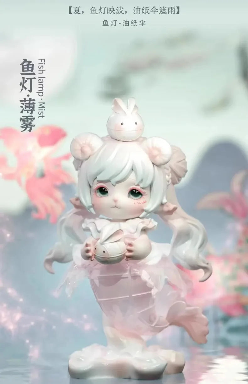 A white collectible figurine of a cute, round-faced creature with pink accents and flowing hair, set against a soft, light ba