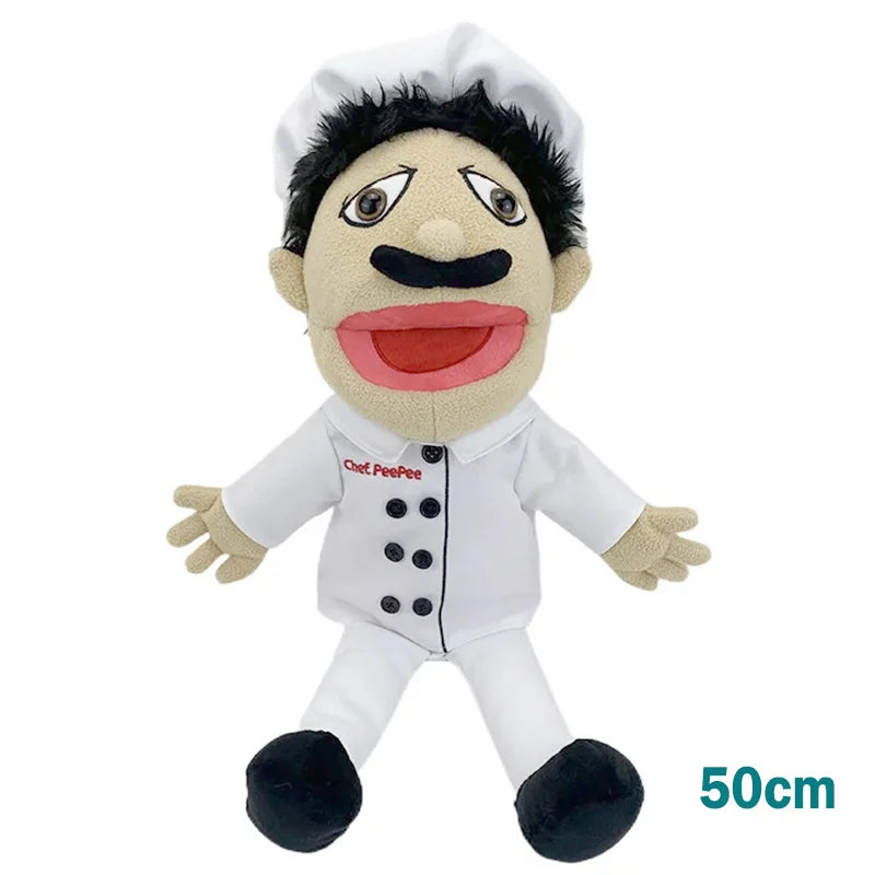 A realistic plush hand puppet of a chef with black hair and a mustache wearing a white chef coat.