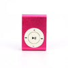 A pink portable mini MP3 player with a circular control button on the front.