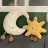 A plushie set featuring a white crescent moon and a yellow star, designed for a cushion or decorative item.