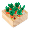 A wooden geometry puzzle set featuring green plant shapes and orange spheres for toddlers.