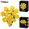A box of 585 pieces of yellow silk rose building blocks forming a bouquet.