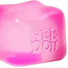 A translucent pink sensory fidget cube with the text 'HEE DEY' molded into the surface.
