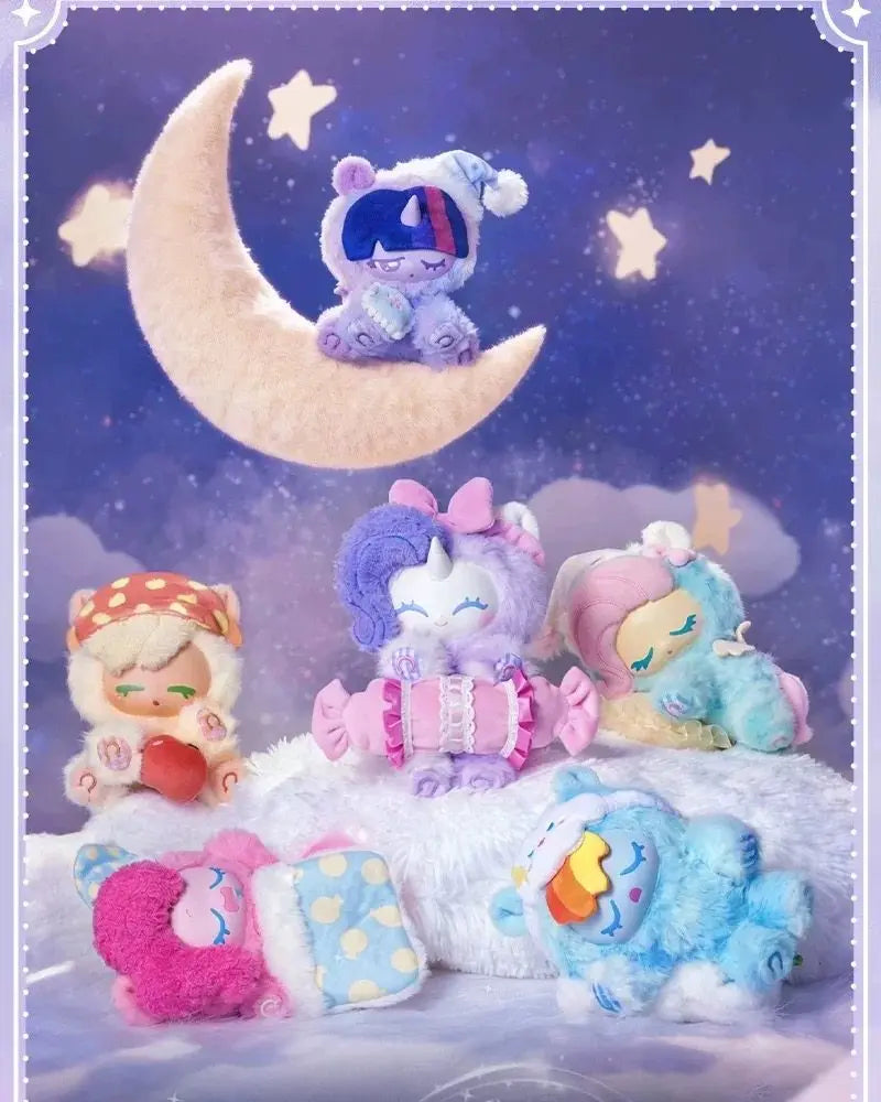A collection of My Little Pony Good Night Dream Series blind box figures, including a unicorn and a pony, resting on a white 